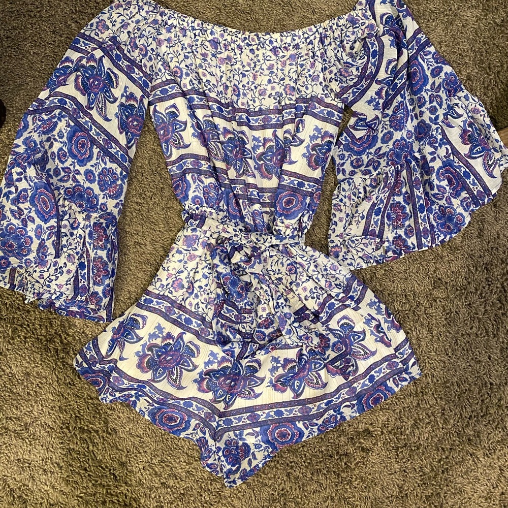 Purple romper with bell sleeves